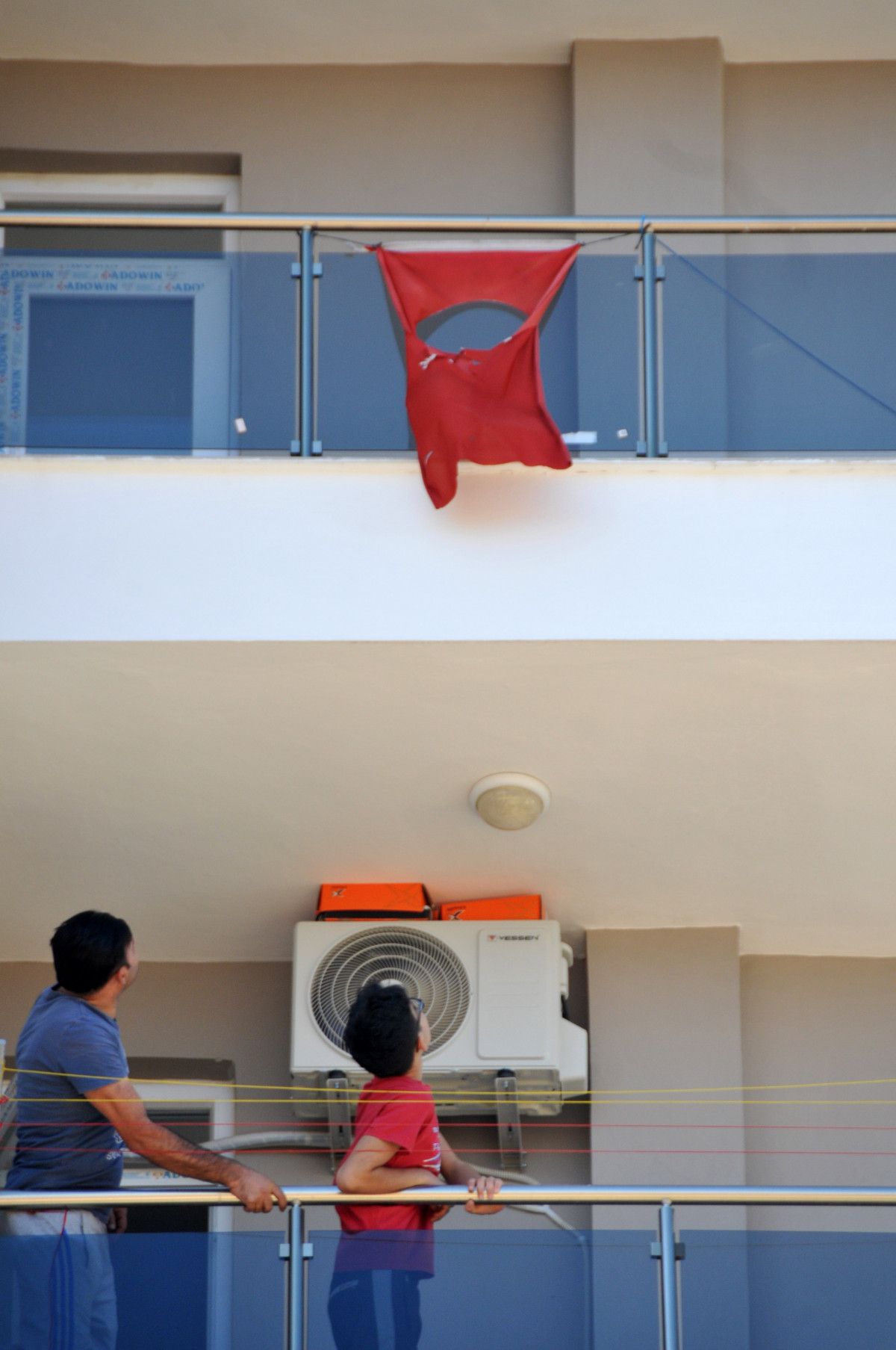 Antalya'da ay ve yıldızı kesilen Türk bayrağı indirildi