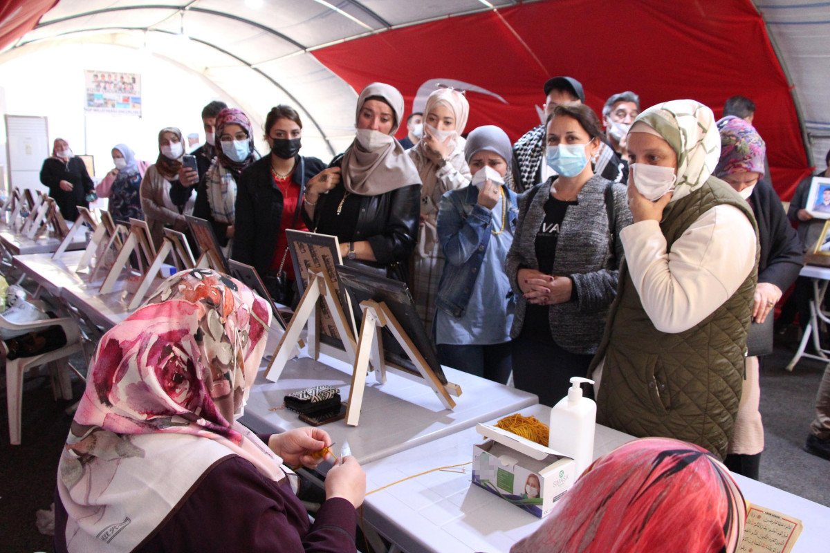 Gurbetçilerden evlat nöbetindeki ailelere ziyaret