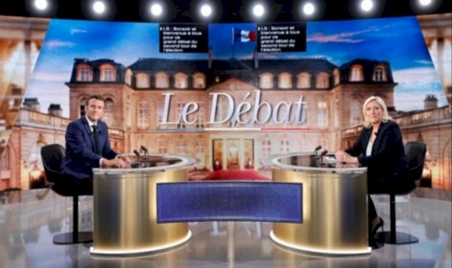 Macron ve Le Pen canlı yayında kozlarını paylaştı
