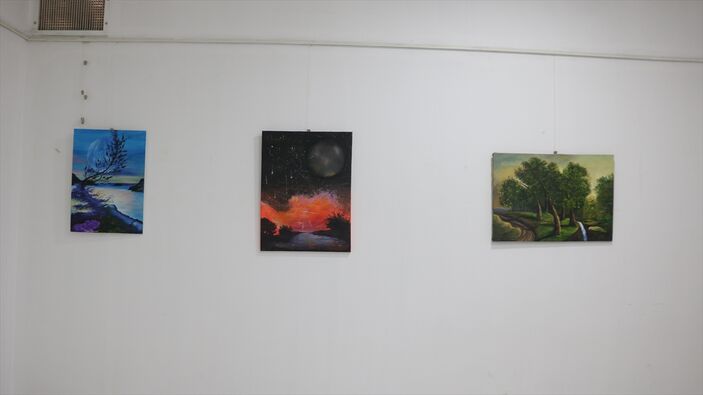 Afganistan'da depremzedelerle dayanışma için sergi açıldı