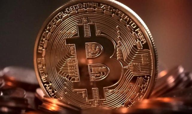 Bitcoin'in fiyatı ilk kez 69 bin doların üzerine çıktı! Yeni güne 66 bin 451 dolardan başladı