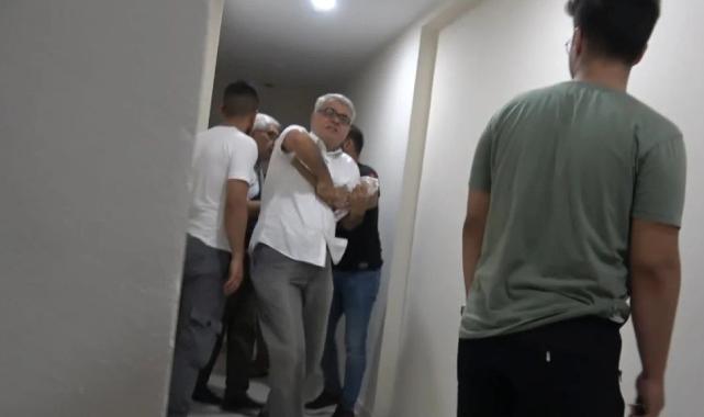 Adana'da aldığı dairenin kapısına duvar örüp, saldırıda bulundular