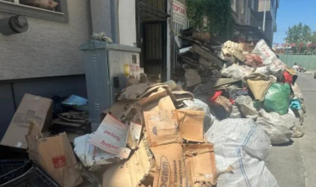 Dairesi çöplerle dolunca yenilerini biriktirmek için dükkan tutmuş