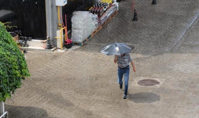 Muğla'da güneşli havada yağmur sürprizi
