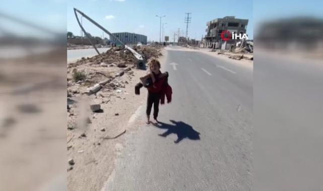 Gazze’den yürek burkan görüntü: Küçük kız çocuğu yaralı kardeşini kilometrelerce omzunda taşıdı