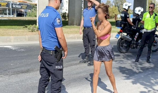 Antalya'da bikinili kadın, polise zor anlar yaşattı