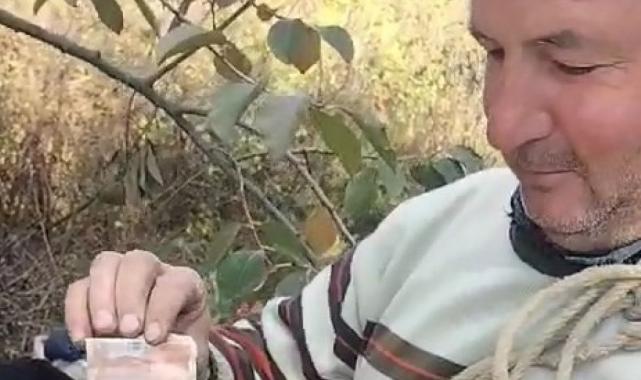 Bursa'da takdirlik hareket: Yediği hurmaların parasını ağaca astı